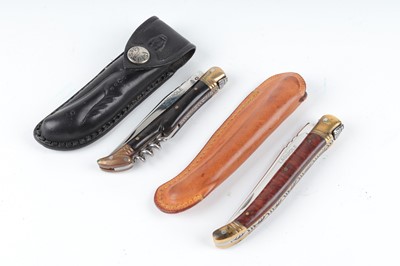 Lot 1093 - Two Laguiole traditional folding pocket knives,...