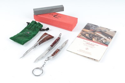 Lot 1095 - Three small Laguiole pocket knives, sharpening...