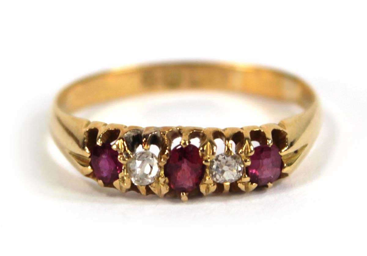 Lot 584 - A late Victorian 18ct yellow gold ring set...