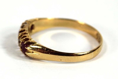 Lot 584 - A late Victorian 18ct yellow gold ring set...