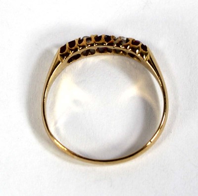 Lot 584 - A late Victorian 18ct yellow gold ring set...