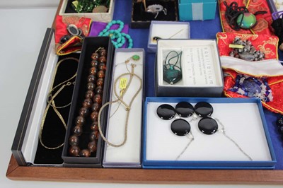 Lot 711 - Eighteen costume jewellery necklaces including...