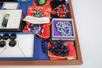 Lot 711 - Eighteen costume jewellery necklaces including...