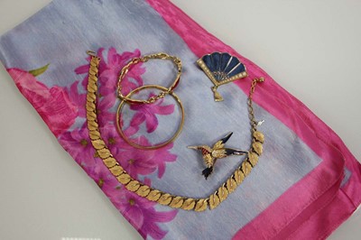 Lot 713 - Four items of Trifari costume jewellery...