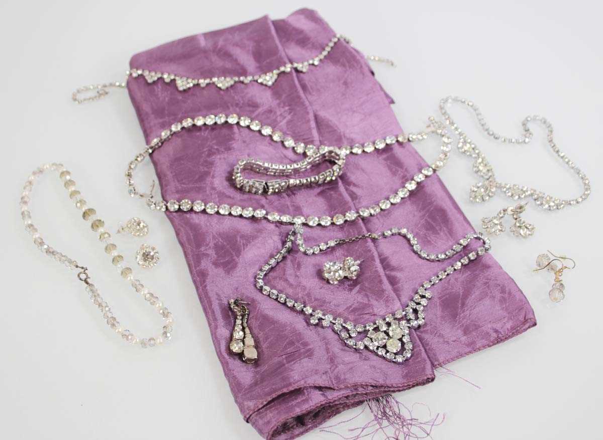 Lot 717 - A group of costume jewellery including...