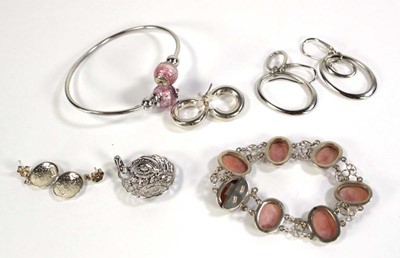 Lot 590 - A group of silver jewellery comprising a...