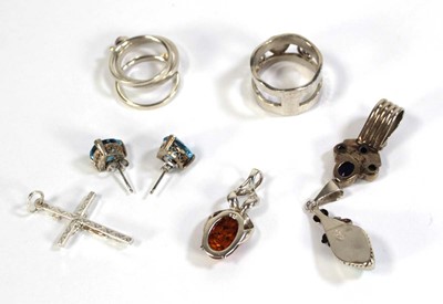 Lot 591 - A group of silver jewellery comprising a three...