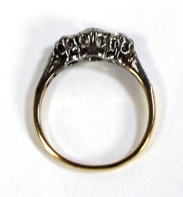 Lot 594 - An 18ct yellow gold and platinum highlighted...
