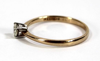 Lot 597 - A 9ct yellow gold ring set brilliant cut...