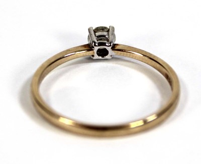Lot 597 - A 9ct yellow gold ring set brilliant cut...