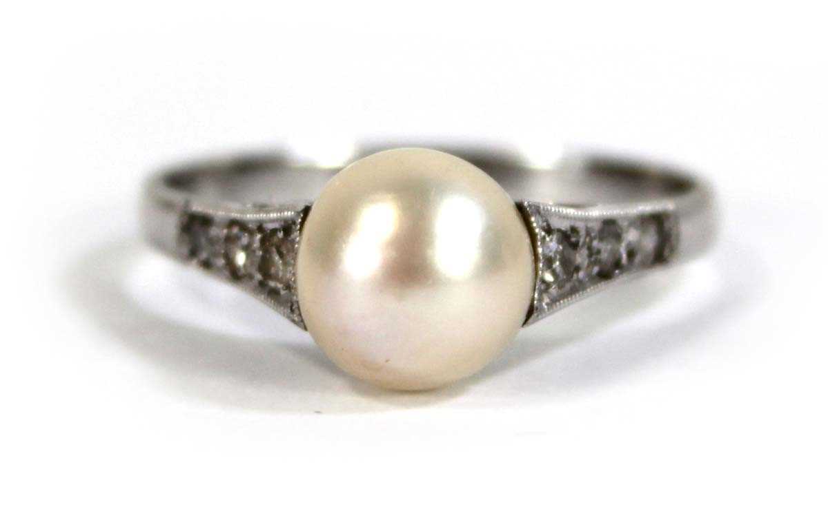 Lot 598 - A 9ct white gold ring set cultured pearl, ring...