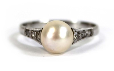 Lot 598 - A 9ct white gold ring set cultured pearl, ring...