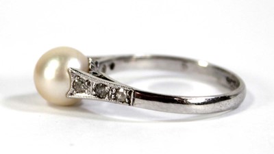 Lot 598 - A 9ct white gold ring set cultured pearl, ring...