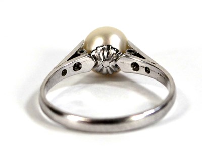 Lot 598 - A 9ct white gold ring set cultured pearl, ring...