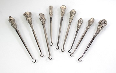 Lot 470 - A group of nine late Victorian button hooks,...
