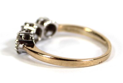 Lot 602 - A 9ct yellow gold triple cluster ring set...