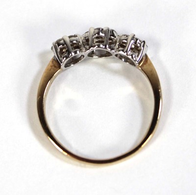Lot 602 - A 9ct yellow gold triple cluster ring set...