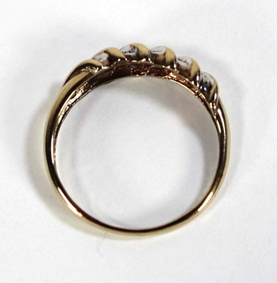 Lot 604 - A 9ct yellow gold ring set five rows of small...