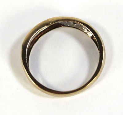 Lot 605 - A 9ct yellow gold ring set small diamonds in a...
