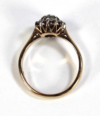 Lot 608 - A 9ct yellow gold cluster ring set pale blue...