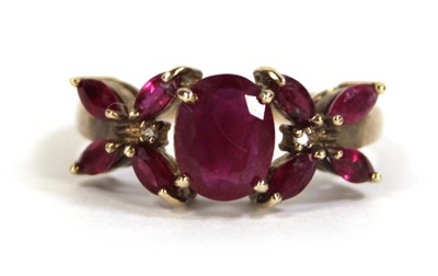 Lot 612 - A 9ct yellow gold ring set oval and marquise...