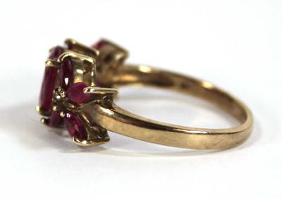 Lot 612 - A 9ct yellow gold ring set oval and marquise...