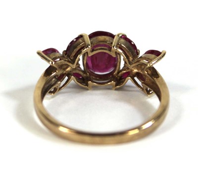 Lot 612 - A 9ct yellow gold ring set oval and marquise...