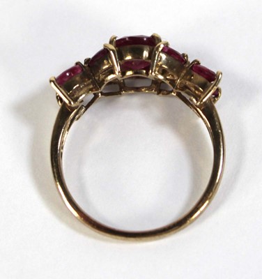 Lot 612 - A 9ct yellow gold ring set oval and marquise...