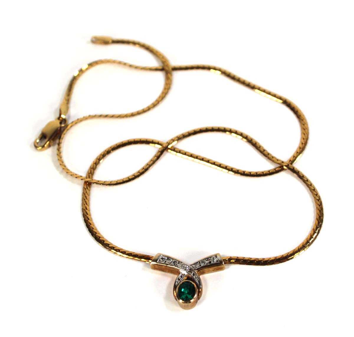 Lot 617 - A 9ct yellow gold flatlink necklace with...