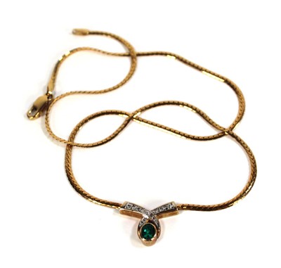 Lot 617 - A 9ct yellow gold flatlink necklace with...