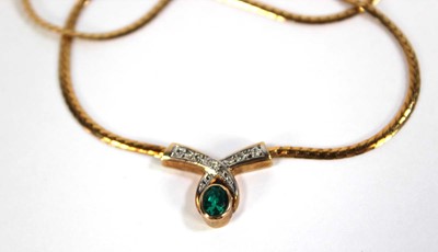 Lot 617 - A 9ct yellow gold flatlink necklace with...