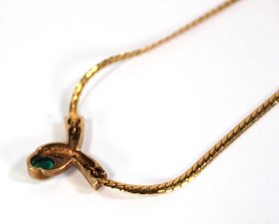 Lot 617 - A 9ct yellow gold flatlink necklace with...