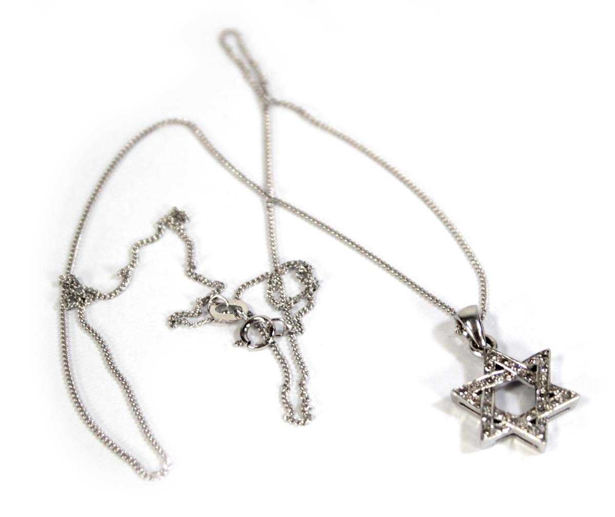 Lot 620 - A 9ct white gold fine flat curblink necklace...