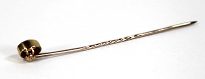 Lot 624 - A 15ct yellow gold stick pin set opal within a...