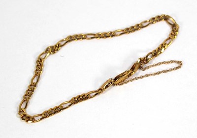 Lot 625 - A 9ct yellow gold figaro link bracelet with...