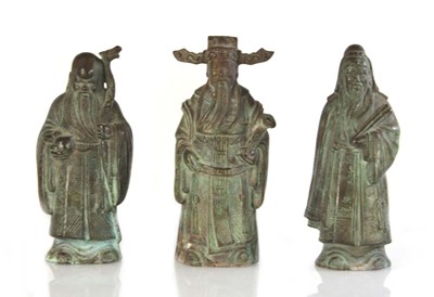 Lot 51 - A set of three Chinese bronze rank figures...