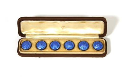 Lot 453 - A set of six white metal and enamel buttons in...