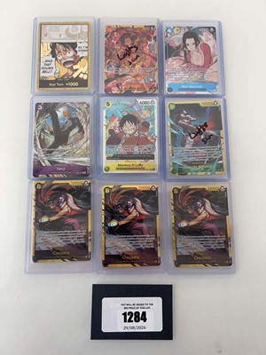 Lot 1284 - 9 Top Loaded One Piece TCG cards from various...