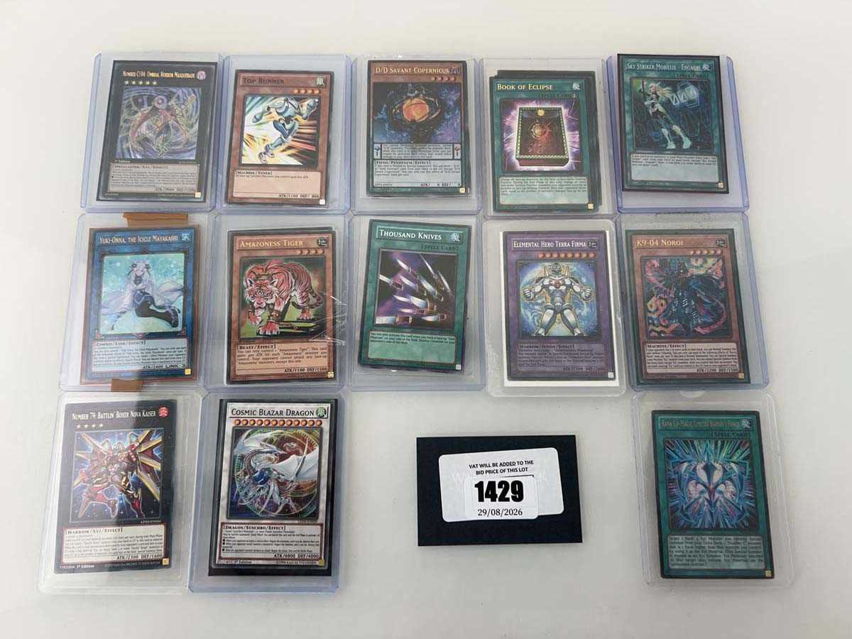 Lot 1429 - Quantity of Top Loaded Yu-Gi-Oh cards form...