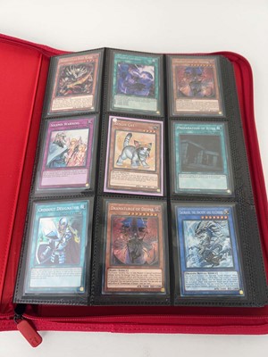 Lot 1508 - Folder containing Yu-Gi-Oh trading cards from...