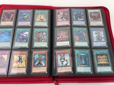 Lot 1508 - Folder containing Yu-Gi-Oh trading cards from...