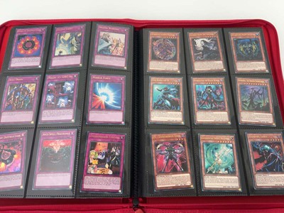 Lot 1508 - Folder containing Yu-Gi-Oh trading cards from...
