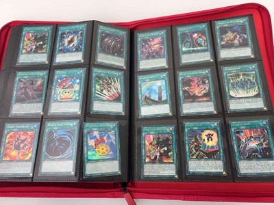 Lot 1508 - Folder containing Yu-Gi-Oh trading cards from...