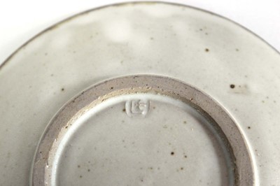 Lot 101 - A Lowerdown Pottery cup and saucer decorated...