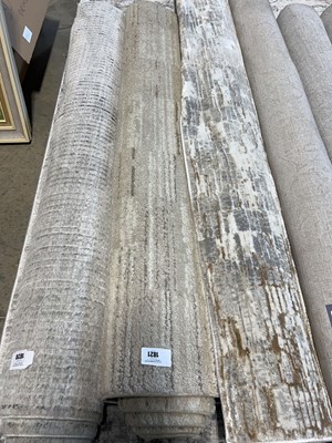 Lot 1821 - Beige area rug