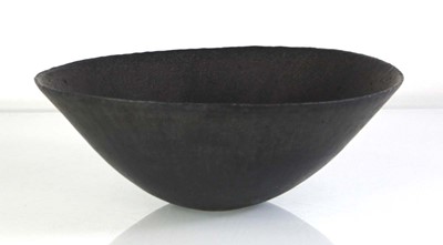 Lot 217 - (C) John Ward (1938-2023), a black glazed...