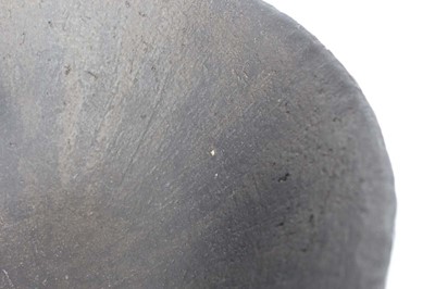 Lot 217 - (C) John Ward (1938-2023), a black glazed...