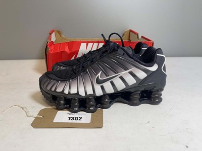 Lot 1302 - Nike UK5 shox tl fade trainers in off noir