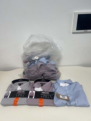 Lot Approx. 10 men's knit button up shirts by...