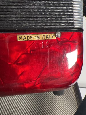 Lot A La Tosca 'Primo' 25 key 12 button piano...